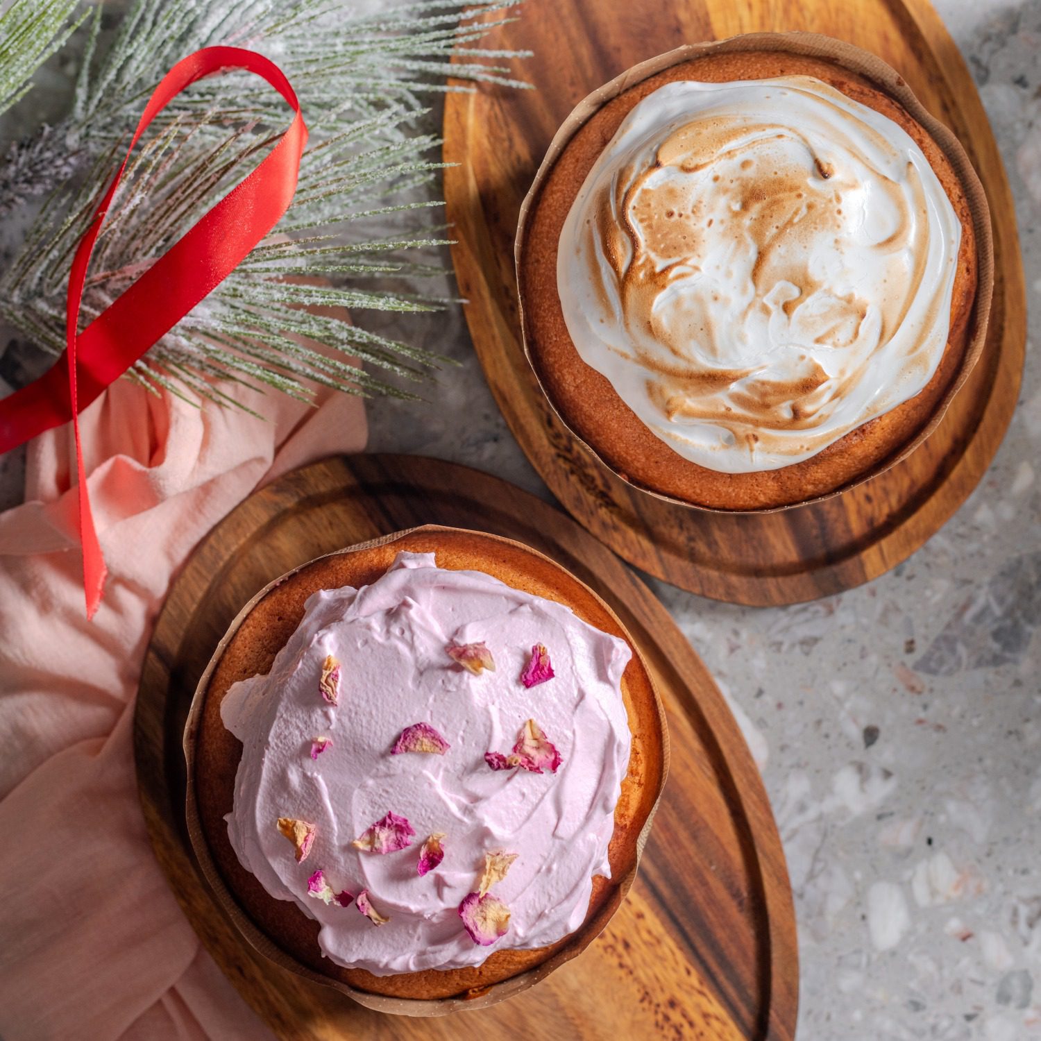 Desserts with whipped toppings on wooden plates