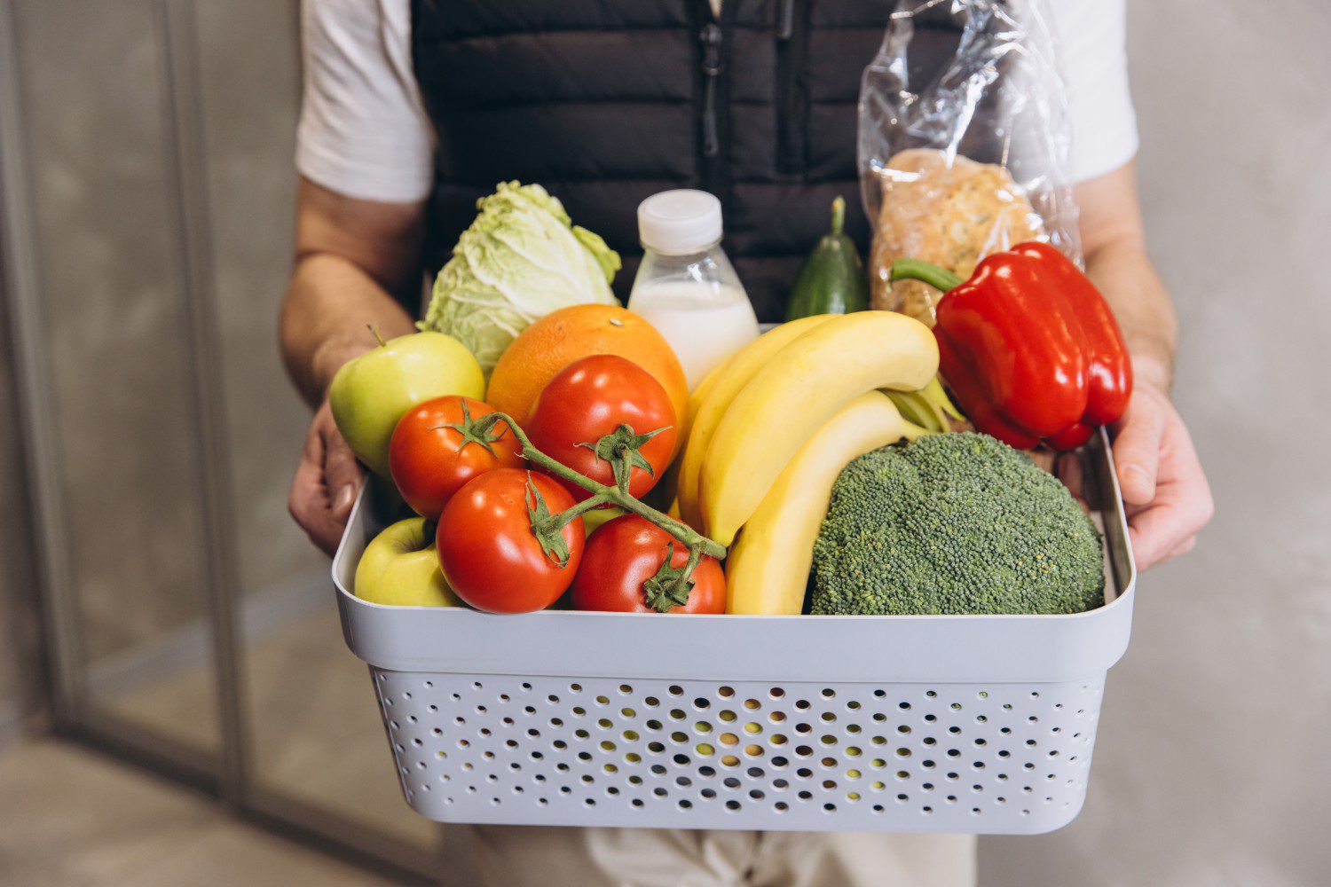Basket of fresh produce and groceries