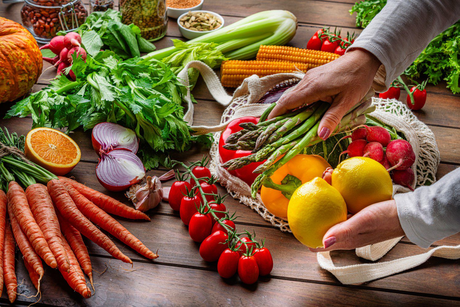 Fresh vegetables and fruits on wooden table