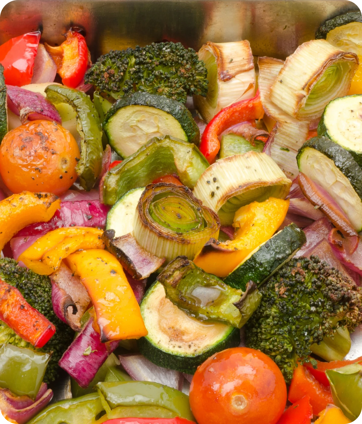 Colorful roasted vegetables in a tray